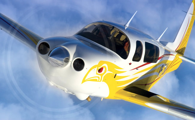yellow and white mooney ovation aircraft appraiser