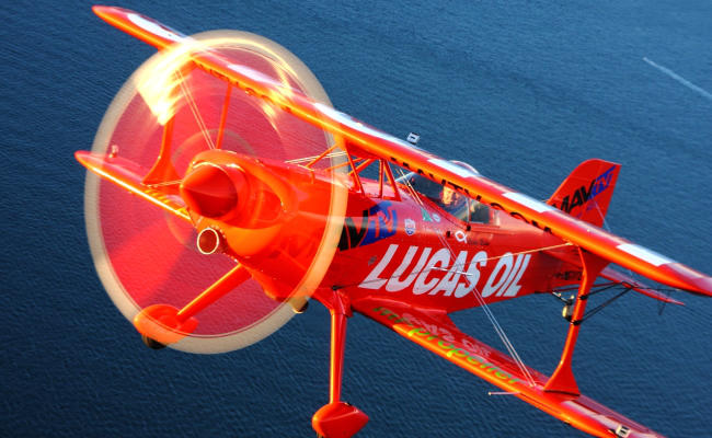 biplane over water ready for an aircraft appraisal