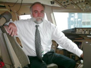 Ken Holder, President and Founder of AERONUVO, The Aircraft Appraisal and Vaulation Company, photograph take at London Heathrow aboard a Boeing 767 aircraft.