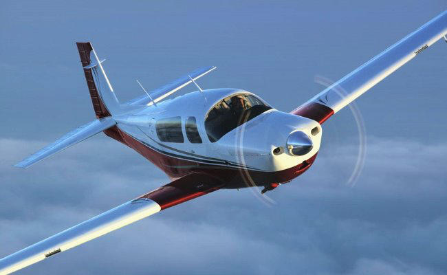 mooney airplane in flight for an aircraft appraiser